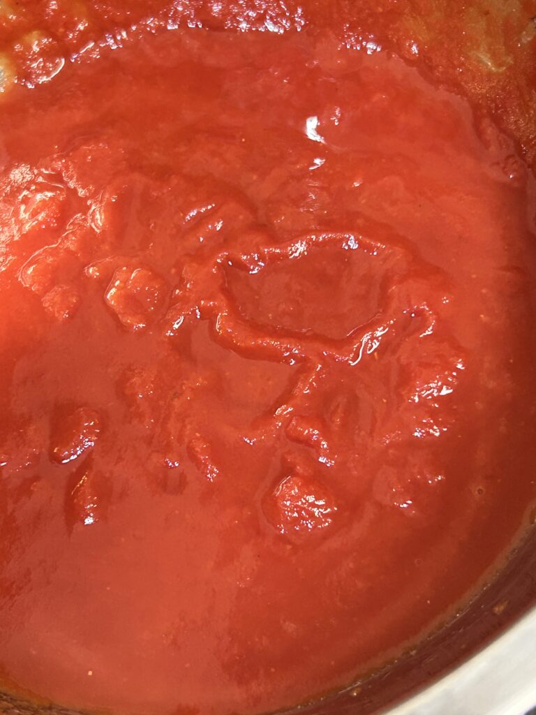 Homemade tomato sauce in a pot.